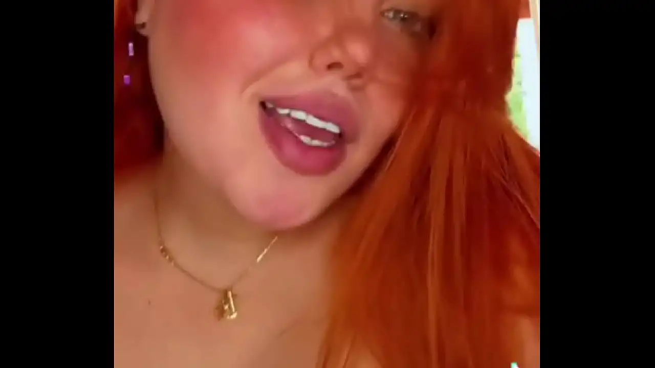 Latin curvy redhead